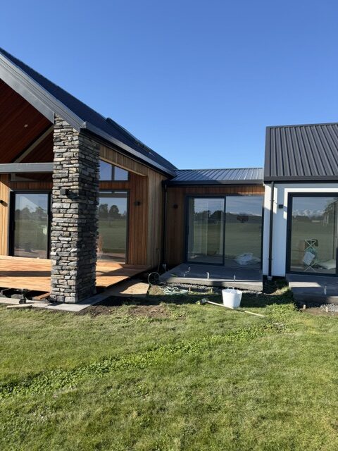 Gable home, white wing